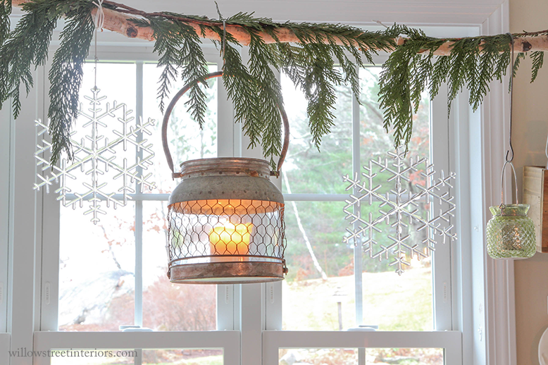 votives, snowflakes, and a lantern