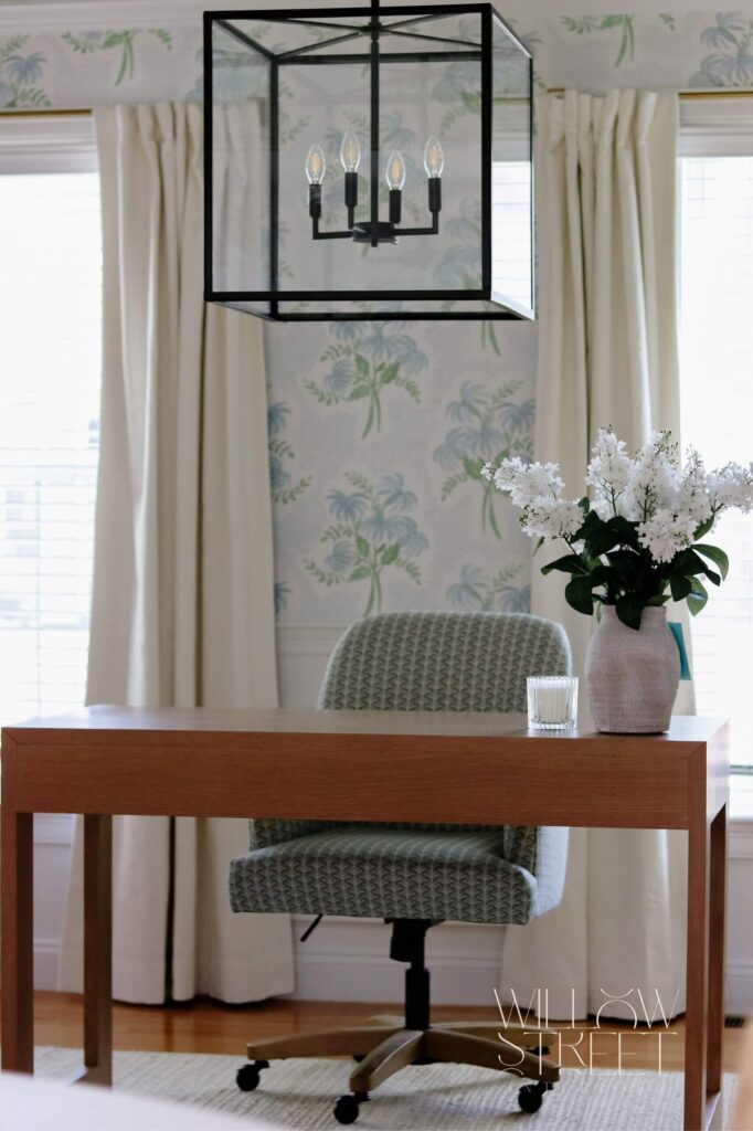 soft and serene home office designed by willow street interiors with muted blues soft greens and white punctuation by rattan and woven pieces